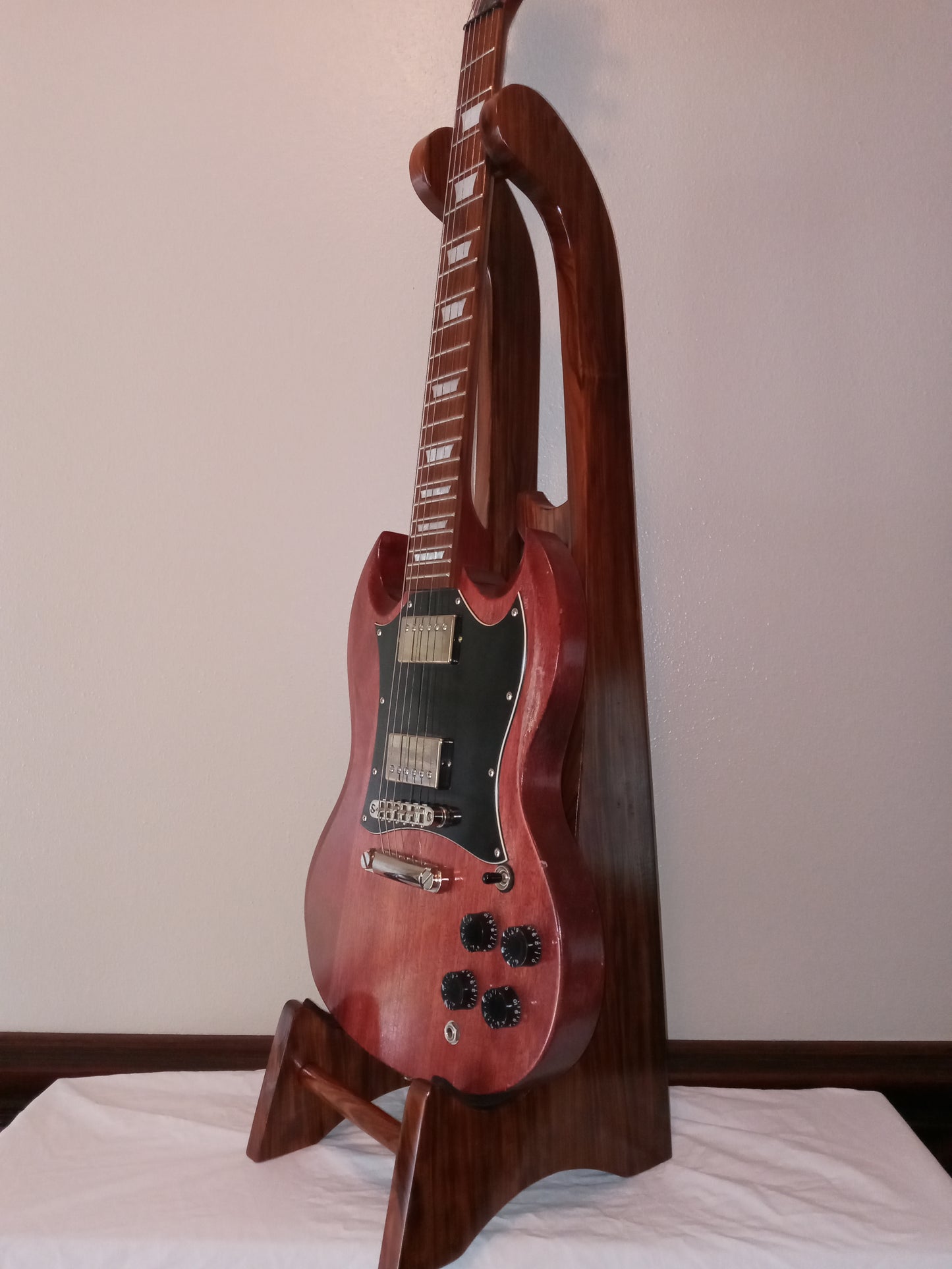 Electric Guitar Stand, New Tall Style. Beautiful and Classy. A perfect compliment to your guitar. Free Shipping included to contiguous USA.